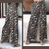 Pantalon Palazzo Fluide Motif Floral Elégant